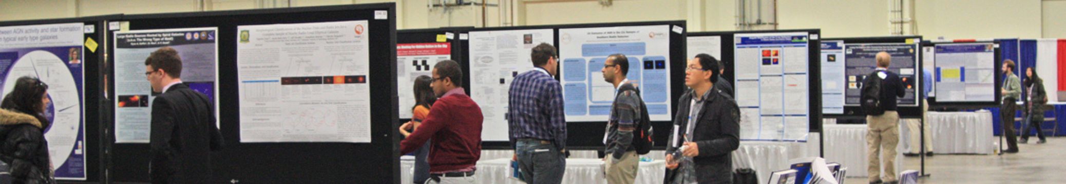 Poster-session metal framed fabric panels lined up in a display hall